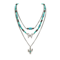 Cowgirl Chic Turquoise Blue Howlite Stone Beads On Multistrand Western Style Butterfly Charm Cactus Pendant Necklace, 14"+3" Extender