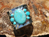 Cowgirl Glam Western Semi Precious Turquoise Howlite Stone Hammered Silver Tone Open Cuff Statement Bracelet, 8"