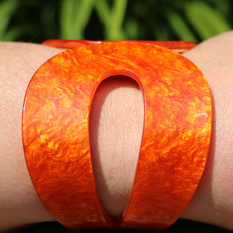 Statement Making Colorful Lucite Hinged Cuff Bangle Bracelet, 7.75" (Marbled Orange With Glitter Flecks, Round)