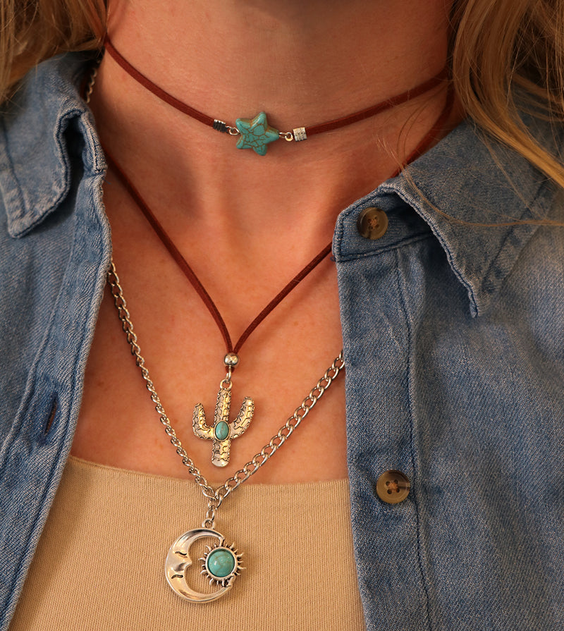 Cowgirl Chic Turquoise Blue Howlite Stone Star Charm Silver Tone Cactus And Moon Pendants On Western Style Vegan Suede Multistrand Necklace, 14"+3" Extender