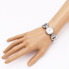 Stylish Round Face Circular Pattern Polished Metal Cuff Bracelet Watch (Silver Tone)